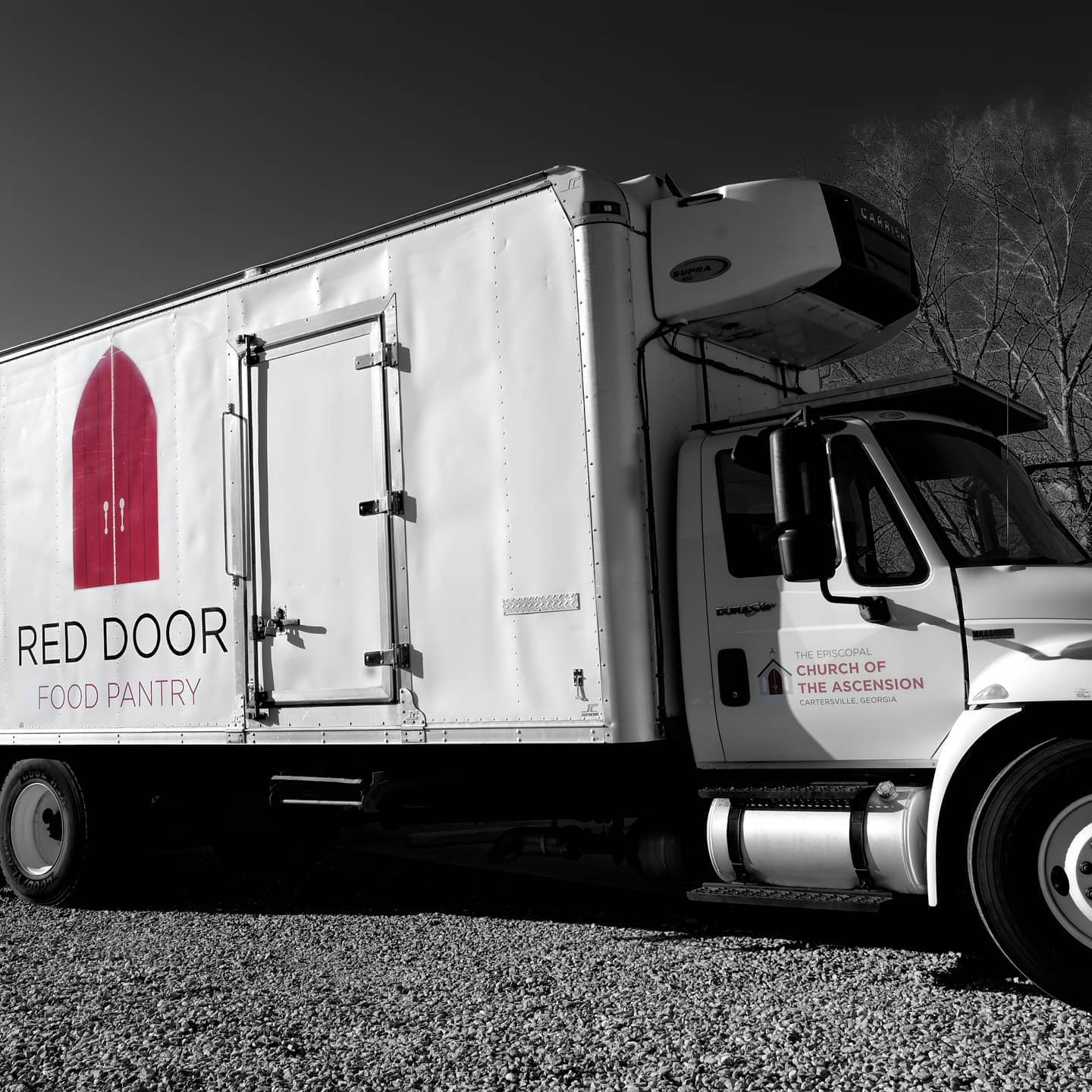 Red Door Food Pantry Logo on truck